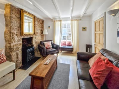 Contemporary decor sits comfortably alongside traditional furnishings | Oaken Cottage, Mousehole, Penzance