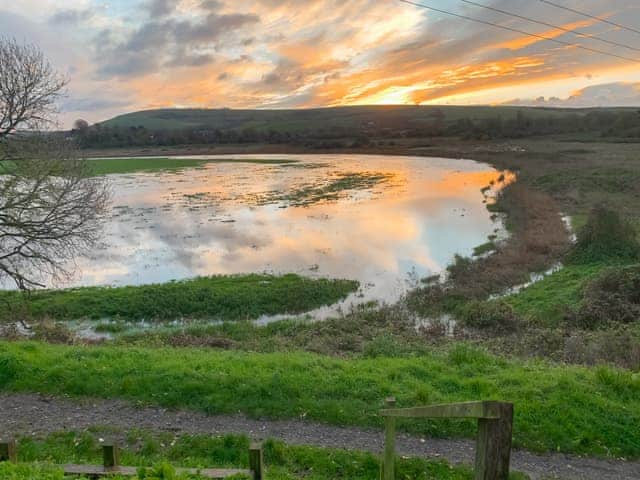 Sun rise over the flooded field | Lodge With A View, Steyning