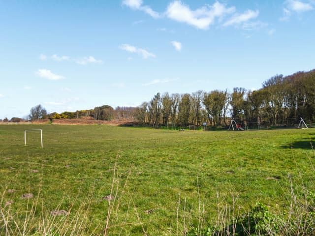 Park and the coastal path is a 2 min walk from the chalet | High Tide, Cromer
