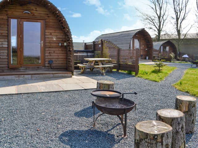 Sitting-out-area | Husk - Kelk Beck Glamping, Kelk, near Driffield
