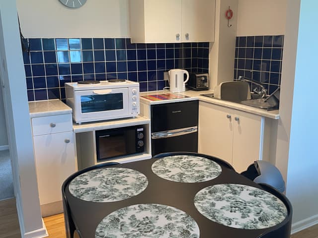 Kitchen area | Greenfinch Apartment - Moorhead Country Holidays, Woolfardisworthy, Clovelly
