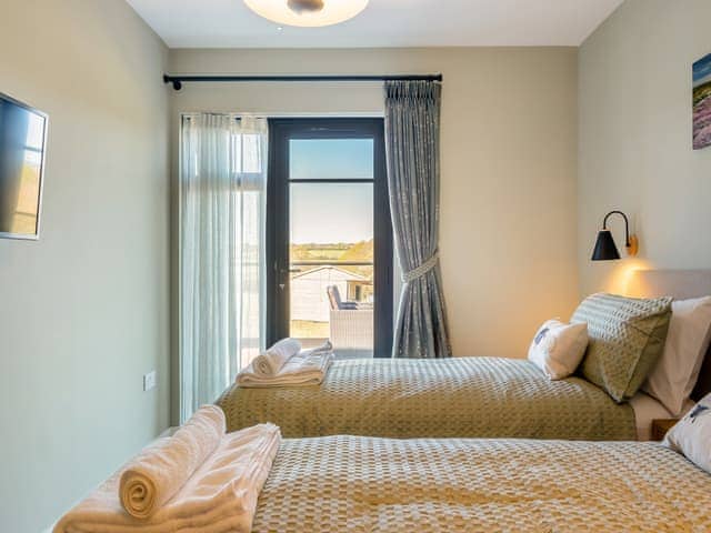 Twin bedroom | The Old Cowshed, Thorness