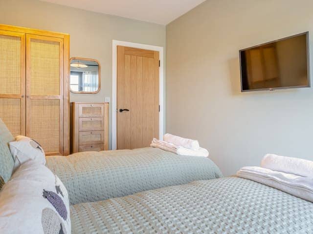 Twin bedroom | The Old Cowshed, Thorness