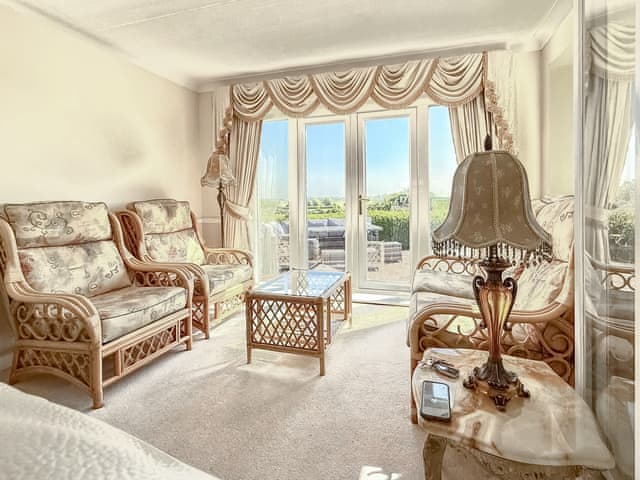 Sun room leading onto outdoor terrace | High Mill House, Freckleton