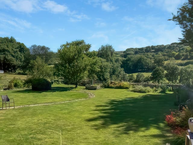 Amazing view from patio overlooking owner&rsquo;s garden | Tanlake Barn, Chard