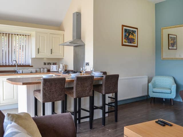 Kitchen area | Jasmine Lodge, Fitling