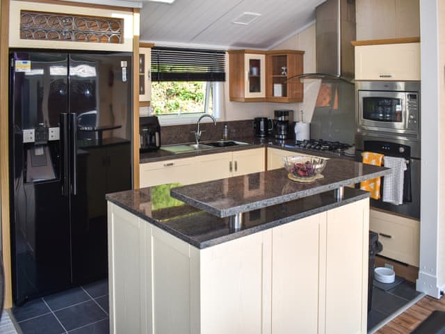 Kitchen area | Holly Lodge, Hele Bay