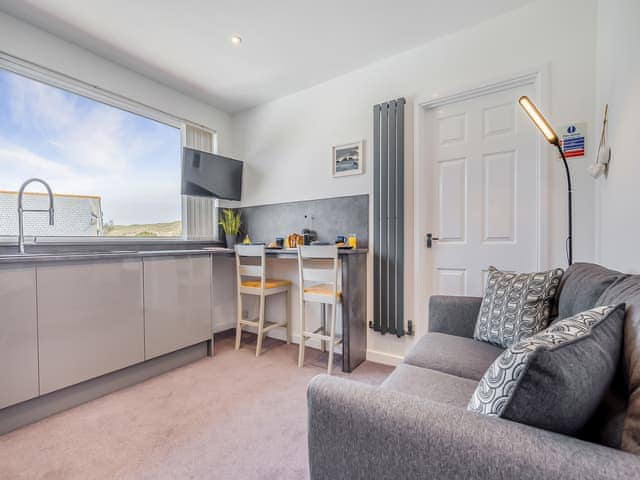 Open plan living space | Ocean Breeze - Bonnie View Beach Apartments, Holywell Bay
