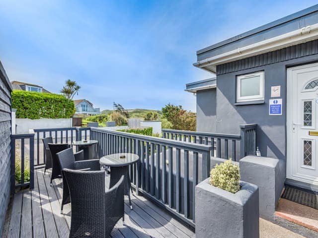 Sitting-out-area | Ocean Breeze - Bonnie View Beach Apartments, Holywell Bay