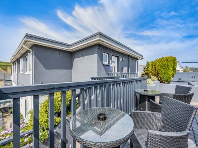 Sitting-out-area | Ocean Breeze - Bonnie View Beach Apartments, Holywell Bay