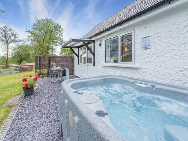 Hot tub | The Lodge - Maesydderwen Holiday Cottages, Llandeilo