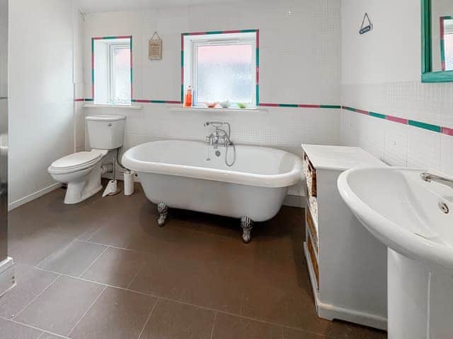 Upstairs bathroom with large free standing bath and separate shower enclosure. + wc | Lilac Villa, Skegness