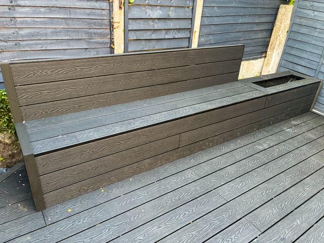 Bench seating in the secluded back garden | Morecambe Home Stays, Lancaster