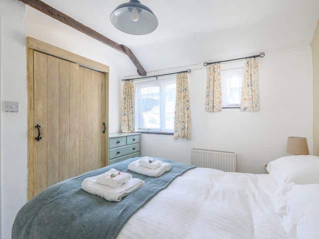 Comfortable double bedroom | Cross Cottage - Sandy Barn Cottages, St Breward, Bodmin Moor