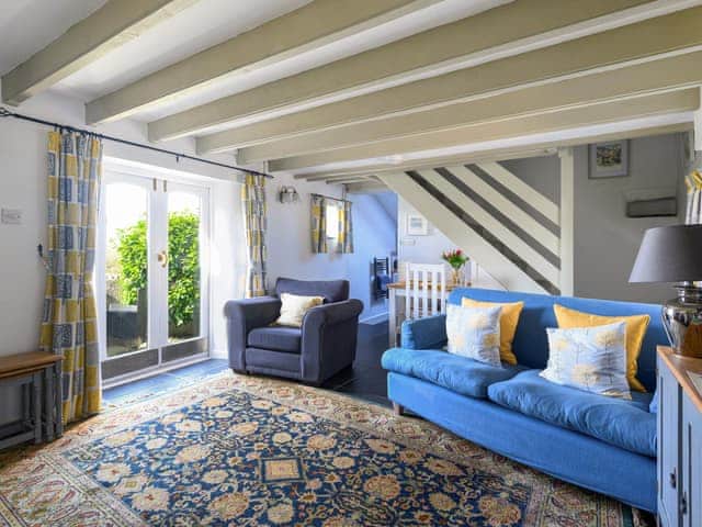 Charming living/ dining room with cosy wood burner | High View - Sandy Barn Cottages, St Breward, Bodmin Moor