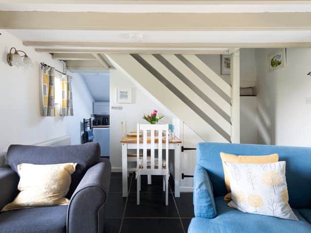 Charming living/ dining room with cosy wood burner | High View - Sandy Barn Cottages, St Breward, Bodmin Moor