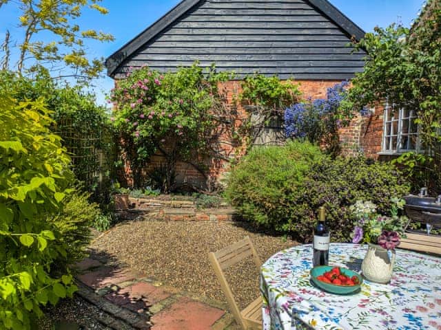 Enclosed garden area | Stable End - Wissett Place Cottages, Halesworth