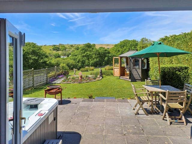 View from back door into garden and the moors beyond | Dunstone Cottage, Cadover Bridge