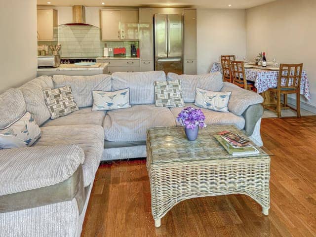 Seating area in open plan living room. | Barn Owl Cottage - Home Farm Retreats, Kirk Hammerton, near York
