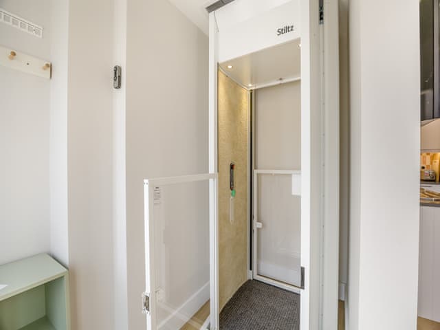 Annexe lift to living area and balcony of main house | Sanderlings, Brancaster