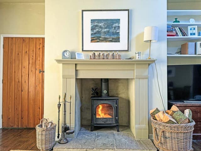 Wood-burning stove in the comfortable living room | Fallodon Burnhouses, near Beadnell
