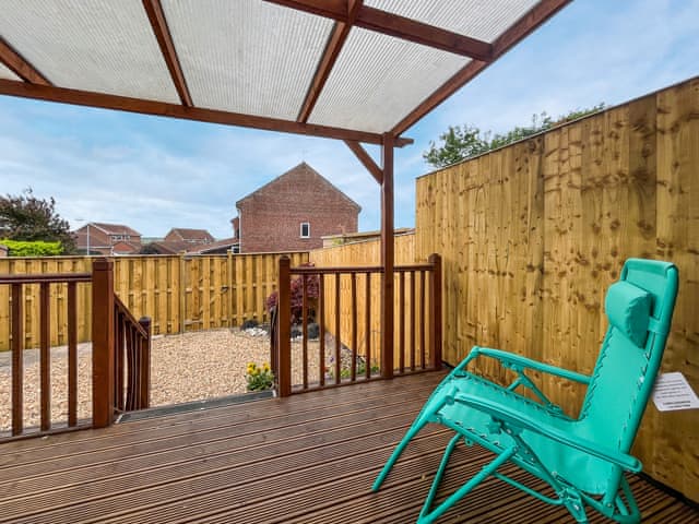 Sitting-out-area | Cayton Cove Cottage, Cayton, near Scarborough