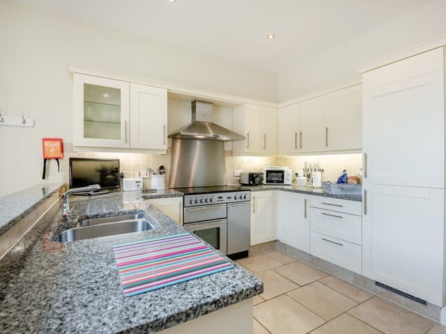 Kitchen/diner | Swinney Cottage - Doxford Cottages, Doxford, near Embleton