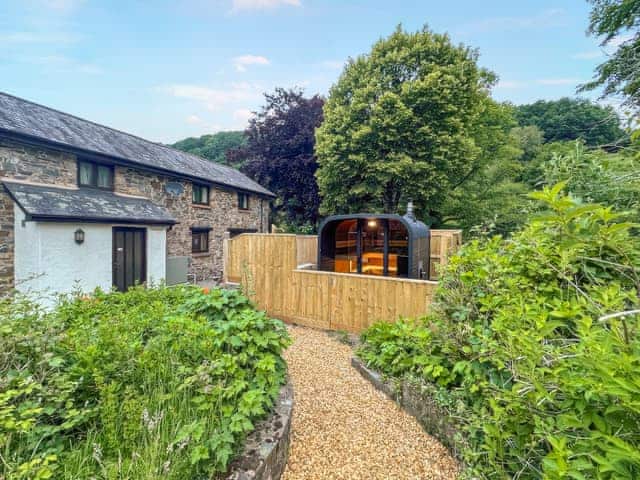 Outside view of one end of the property | Orchard Barn - Duvale Cottages, Bampton, near Tiverton