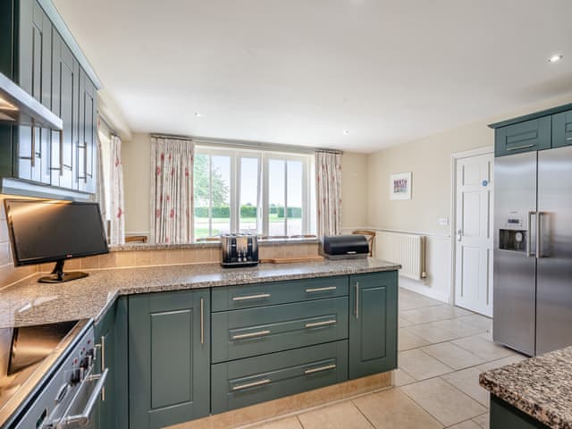 Kitchen/diner | Coach House - Doxford Cottages, Doxford, near Embleton