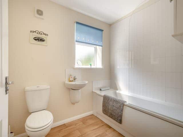 Family bathroom with shower over bath | Daffodil - Clapham Holme Farm Cottages, Great Hatfield, near Hornsea