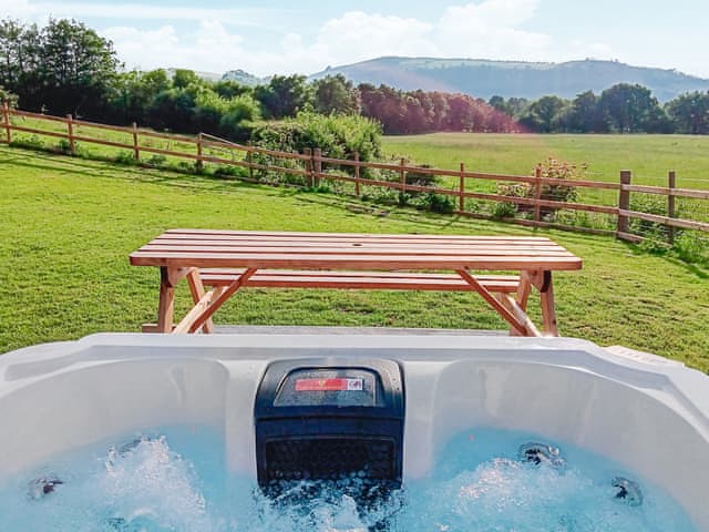 Hot tub | Teifi Cottage - Ffynnongrech Farm Cottages, Talley, near Llandeilo