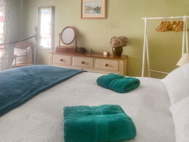 King size bedroom overlooking garden | The Yellow House, Gorleston-on-Sea