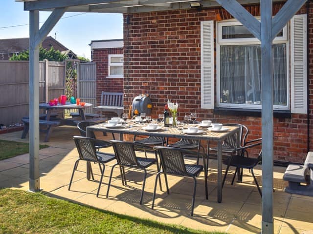 Outdoor eating area | Coastguard Cottage, Caister-on-Sea, near Great Yarmouth