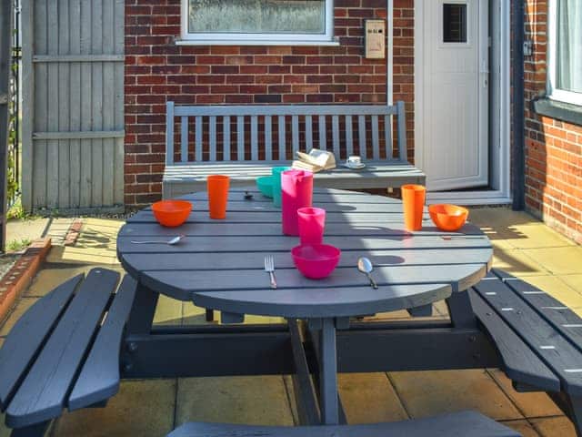 Outdoor eating area | Coastguard Cottage, Caister-on-Sea, near Great Yarmouth