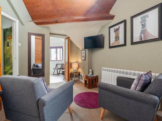 Cosy seating area in The Stable Loft holiday apartment Bowness on Windermere | The Stable Loft - The Stables Apartments, Bowness on Windermere