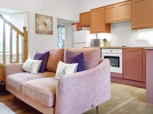 Open plan living space with newly fitted kitchen with oven, dishwasher and washing machine | School Cottage, Newbiggin-in-Bishopdale, near Leyburn