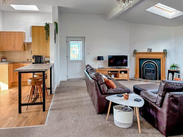 Open plan lounge and kitchen area | The Crofts, Winsford
