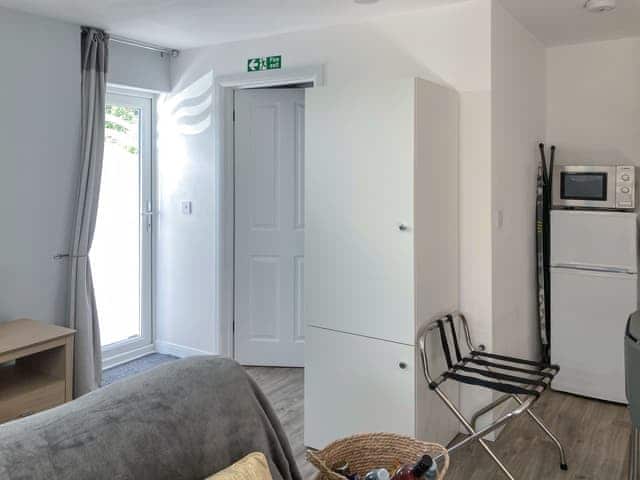 Wardrobe for hanging clothes with shelf below for shoes etc. | The Secret Luxury Apartment, New Romney, near Littlestone-on-Sea