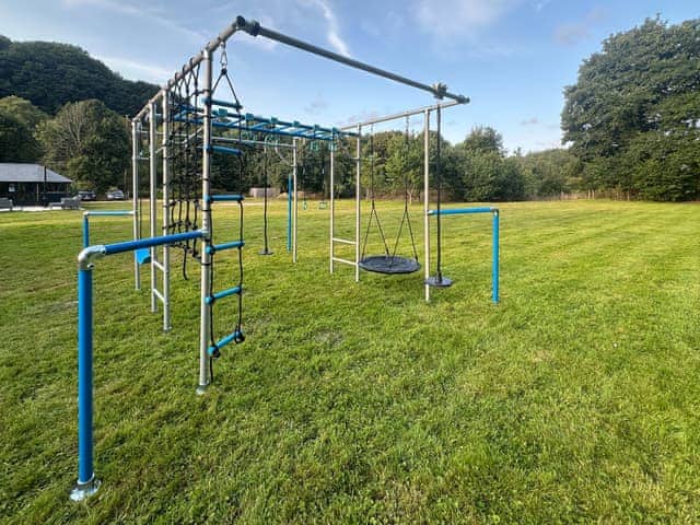 children&rsquo;s climbing frame for children age 5 to 12. children must be supervised at all times | Orchard Barn - Duvale Cottages, Bampton, near Tiverton