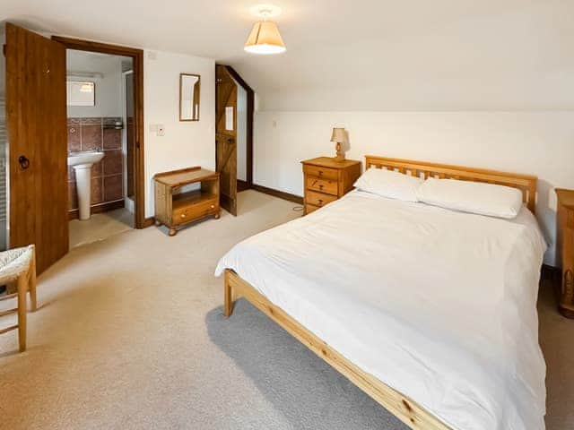 Comfortable double bedroom with en-suite | Duvale Barn - Duvale Cottages, Bampton, near Tiverton