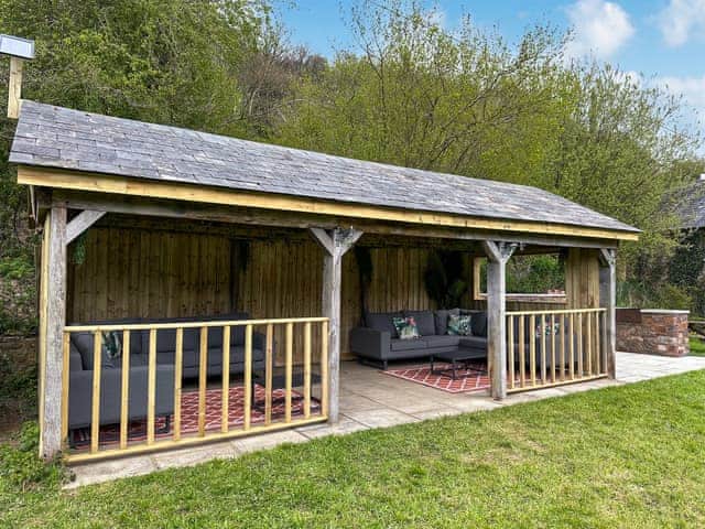 Sitting-out-area | Duvale Barn - Duvale Cottages, Bampton, near Tiverton