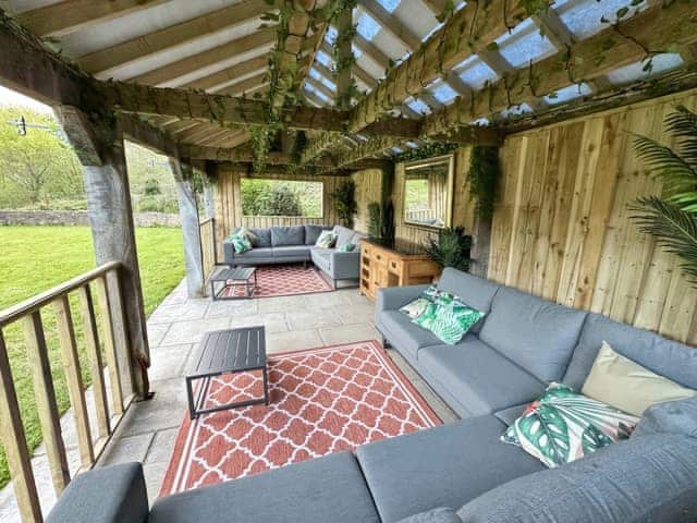 Sitting-out-area | Duvale Barn - Duvale Cottages, Bampton, near Tiverton
