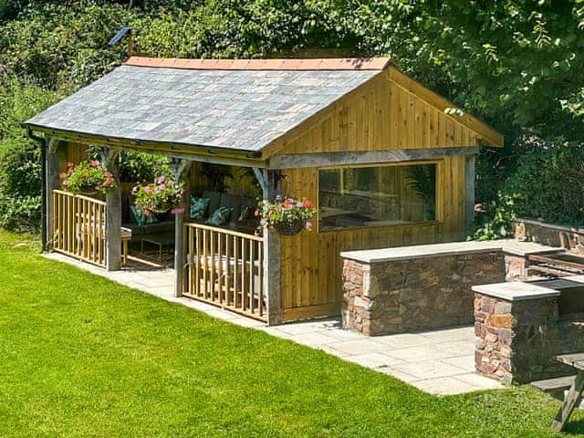 Sitting-out-area | Duvale Barn - Duvale Cottages, Bampton, near Tiverton