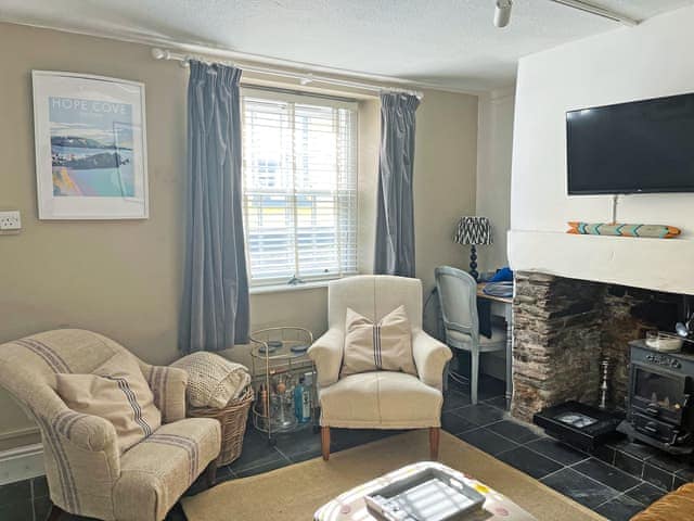 Cosy lounge to relax in and catch up on a good book or film | Le Grand Bleu, Aveton Gifford, near Bigbury-on-Sea and Challaborough