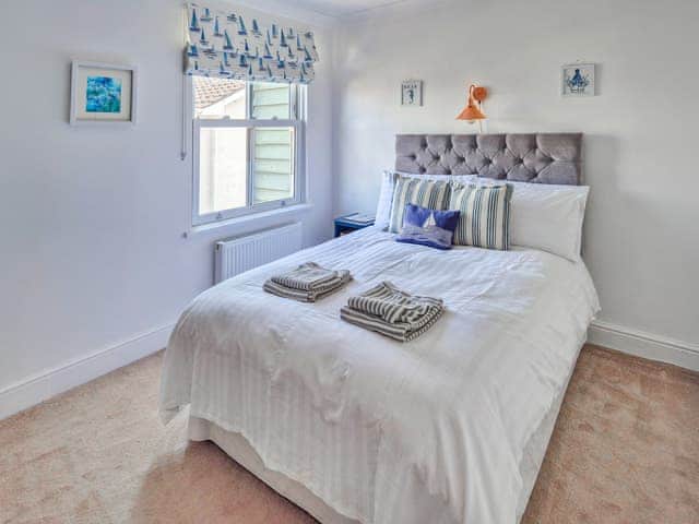 Double bed. Bed guards are available for children. | Chandler’s Cottage, West Mersea