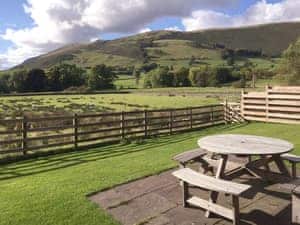 Lovely garden with spectacular views of the local landscape | The Garth - Blakebeck Farm, Mungrisdale, near Threlkeld