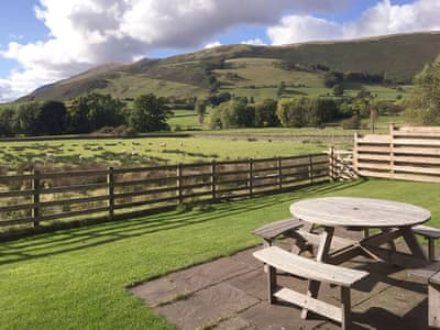 Lovely garden with spectacular views of the local landscape | The Garth - Blakebeck Farm, Mungrisdale, near Threlkeld