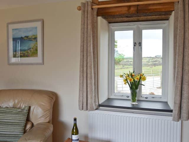 Living room with window views | Tresidder Barn, Constantine, near Falmouth