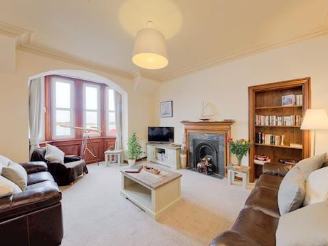 Grand, spacious living room with views over the Bay | Argyll Mansions, Oban