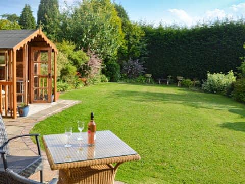 Attractive, rear, lawned garden | Heather House, Bakewell